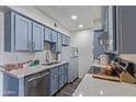 Well-equipped kitchen featuring stainless steel appliances, ample counter space, and stylish cabinetry at 2625 E Indian School Rd # 343, Phoenix, AZ 85016