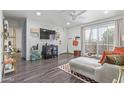 Relaxing living room with a ceiling fan, balcony, and views at 2625 E Indian School Rd # 343, Phoenix, AZ 85016