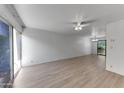 Spacious living room with lots of natural light and hardwood flooring, and ceiling fan at 4630 N 68Th St # 280, Scottsdale, AZ 85251
