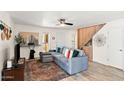 Open living room with comfortable seating, statement art, and bright, airy feel at 841 E Peoria Ave # 2, Phoenix, AZ 85020
