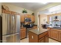 Well-equipped kitchen featuring stainless steel appliances, granite countertops, and ample cabinet space at 9550 E Thunderbird Rd # 152, Scottsdale, AZ 85260