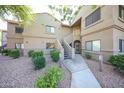 The exterior of the building features well-maintained landscaping and a cozy atmosphere at 15225 N 100Th St # 1185, Scottsdale, AZ 85260