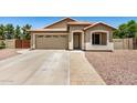 Well maintained single-story home showcasing a neutral color palette, well-manicured landscaping at 1583 N Constellation Ct, Gilbert, AZ 85234