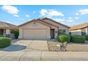 Charming single-story home showcasing manicured front yard, desert landscaping, and a two-car garage for comfortable living at 2432 W Oberlin Way, Phoenix, AZ 85085