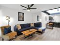 Cozy living room featuring a comfortable blue sofa, stylish decor, and bright lighting at 2946 N 14Th St # 37, Phoenix, AZ 85014
