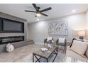 Cozy living room with a fireplace and modern decor at 1005 N Granite Reef Rd, Scottsdale, AZ 85257