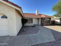 Home with a walkway, brick accents, desert rock landscaping, and red tile roof at 4008 E Knox Rd, Phoenix, AZ 85044