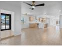 Spacious open-concept living room flows seamlessly into the kitchen and is ideal for entertaining guests at 4400 N 20Th St, Phoenix, AZ 85016