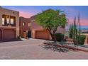 Inviting multi-level home with a desert-landscaped yard and a private two-car garage at 13227 N Mimosa Dr # 101, Fountain Hills, AZ 85268