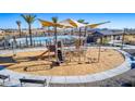 Well-equipped community playground near the pool, perfect for Gathering fun and recreation at 16955 W Poinsettia Dr, Surprise, AZ 85388