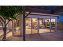 Cozy covered patio area with comfortable seating, perfect for relaxing and entertaining outdoors at 28021 N 23Rd Dr, Phoenix, AZ 85085