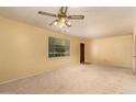 Inviting living room offering natural light and carpet, perfect for a comfortable and bright space at 4140 E Glenrosa Ave, Phoenix, AZ 85018
