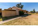 Charming single-Gathering home with a covered parking area, a tiled roof and easy access at 4814 W Rose Ln, Glendale, AZ 85301