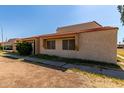 Inviting single-story home, showcasing its classic architecture and accessible design at 4814 W Rose Ln, Glendale, AZ 85301