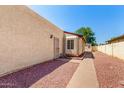 Backyard featuring low maintenance desert landscaping at 619 E Jensen St # 14, Mesa, AZ 85203