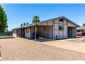 Property featuring desert landscaping, carport, wheelchair ramp, and a clean exterior design at 7343 E Juanita Ave, Mesa, AZ 85209