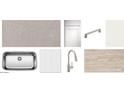 Modern kitchen design elements including a stainless steel sink, gray quartz countertop, and wood-look flooring at 18247 W Camino De Oro --, Surprise, AZ 85387