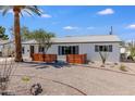 Charming home exterior with desert landscaping and a quaint, inviting facade at 1930 W Missouri Ave, Phoenix, AZ 85015
