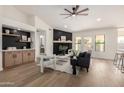 Open living area features a decorative fireplace wall and stylish furnishings at 2716 N Kristen --, Mesa, AZ 85213