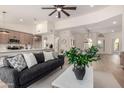 Bright living room featuring an open floor plan with wood floors and neutral decor at 2716 N Kristen --, Mesa, AZ 85213