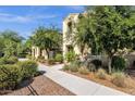 Charming two-story home featuring a private balcony and desert landscaping at 3131 S Mingus Dr, Chandler, AZ 85286