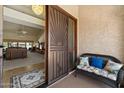 View from front door into the home's open living area, showing the decor and furnishings at 10152 E Aster Dr, Scottsdale, AZ 85260