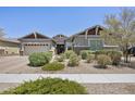 Attractive one-story home with a well-manicured lawn and desert landscaping, creating inviting curb appeal at 2514 E Pleasant Ln, Phoenix, AZ 85042