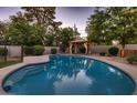 Inviting backyard pool with a gazebo perfect for relaxing and entertaining in a private setting at 2518 E Flower E St, Phoenix, AZ 85016