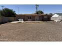 Spacious backyard area, featuring laundry hookups and ample room for various uses at 608 W 2Nd Pl, Mesa, AZ 85201