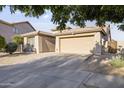 Well-kept single-Gathering home with low-maintenance desert landscaping and an attached two-car garage at 6623 S 23Rd Dr, Phoenix, AZ 85041