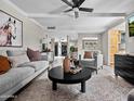 This spacious living room is decorated with modern furniture and decor at 1 W Canterbury Ln, Phoenix, AZ 85023