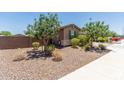 Well-maintained side yard, featuring low-maintenance landscaping and desert-friendly plants at 8735 N 185Th Ave, Waddell, AZ 85355