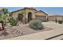 Charming single-story home with desert landscaping, a two-car garage, and a well-maintained exterior at 16126 N 159Th Dr, Surprise, AZ 85374