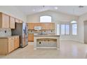 Updated kitchen featuring granite countertops, stainless appliances and a breakfast nook at 16126 N 159Th Dr, Surprise, AZ 85374