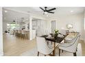 Dining room with modern decor and access to kitchen at 2608 W Aster Dr, Phoenix, AZ 85029