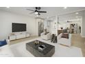 Living room with kitchen and dining room views at 2608 W Aster Dr, Phoenix, AZ 85029