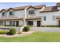 Inviting townhomes with well-manicured lawns and clay tile roofs create a charming exterior at 2986 N Oregon St # 7, Chandler, AZ 85225