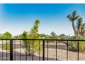 Scenic balcony view overlooking desert landscaping, distant mountains and a clear blue sky at 16852 E La Montana Dr # C18, Fountain Hills, AZ 85268