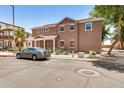 Two-story home featuring neutral paint, covered porch, and low-maintenance landscaping in a desirable location at 89 E Palomino Dr, Gilbert, AZ 85296