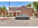 Two-story home featuring neutral paint, covered porch, and low-maintenance landscaping in a desirable location at 89 E Palomino Dr, Gilbert, AZ 85296