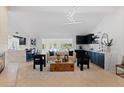 Bright living room with modern lighting, tile flooring, fireplace, and stylish decor at 1509 W Kiowa Ave, Mesa, AZ 85202