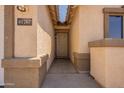 Covered entryway leading to the front door with house number 41767 visible at 41767 W Somerset Dr, Maricopa, AZ 85138