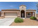 Charming single-story home with a neutral color scheme, desert landscaping, and a covered porch at 5039 S 237Th Ln, Buckeye, AZ 85326
