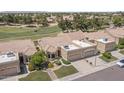 Beautiful single-story home boasts a tile roof, well-kept lawn, and convenient two-car garage at 8431 W Utopia Rd, Peoria, AZ 85382