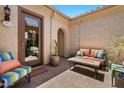 Cozy patio with comfortable seating and desert landscaping at 10914 E Tarragon Ave, Mesa, AZ 85212