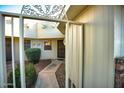 Inviting courtyard entrance featuring decorative ironwork and a well-maintained walkway at 17441 N Del Webb Blvd, Sun City, AZ 85373