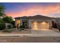 Charming single-story home with desert landscaping and a two-car garage at 22432 N 52Nd Pl, Phoenix, AZ 85054