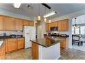 Eat-in kitchen featuring an island and ample counter space at 3128 W Belle Ave, San Tan Valley, AZ 85144