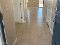 View of the entryway featuring tile flooring and white trim work throughout at 31774 N Bandit Rd, San Tan Valley, AZ 85143