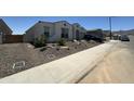 Lovely single-story home with desert landscaping, and neutral color scheme at 19929 W Marshall Ave, Litchfield Park, AZ 85340